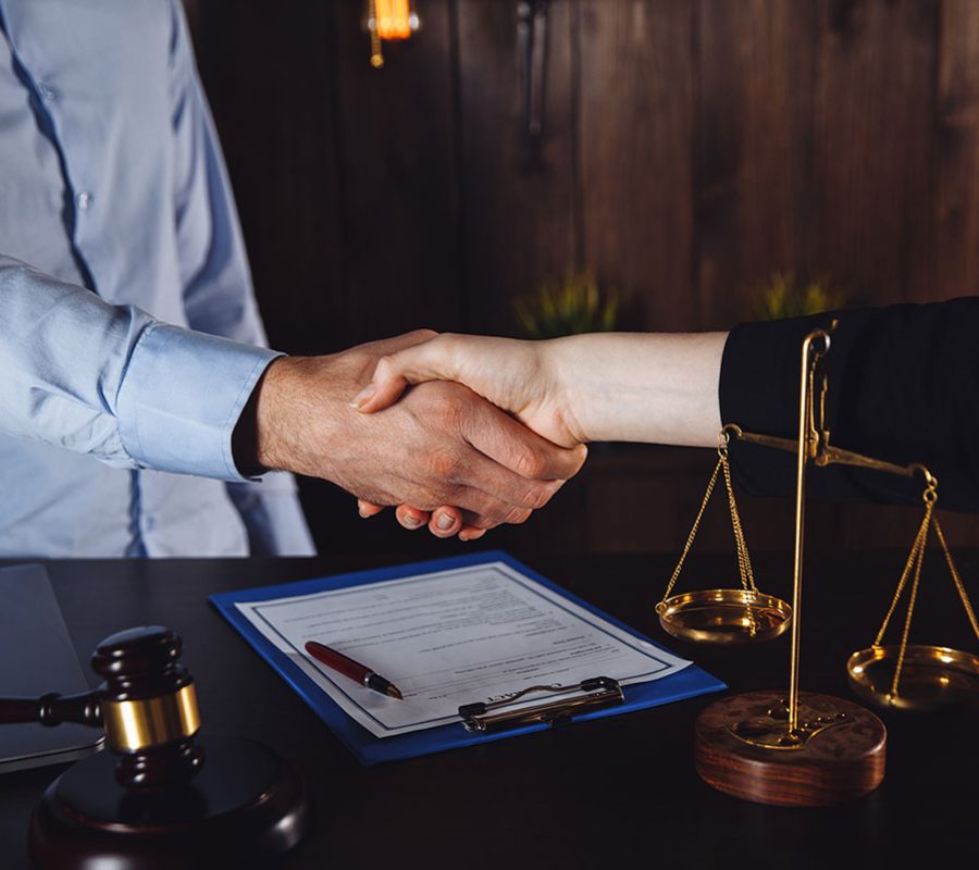 male-female-lawyer-business-meeting-legal-consulting-office.jpg